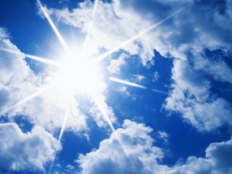 Sun Shining Through Clouds — Blue, Photograph