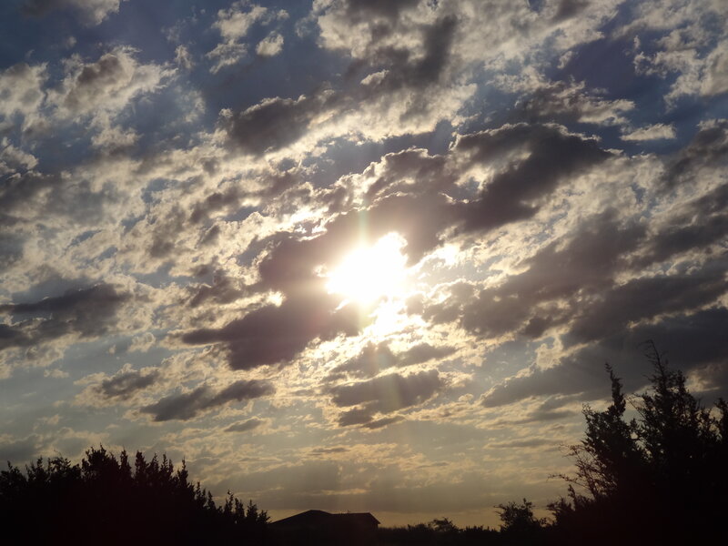 Sun Through Clouds — Blue, Dramatic