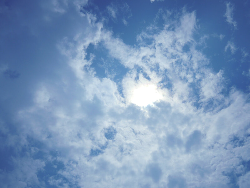 Sun Through Clouds — Blue, Serene, Afternoon