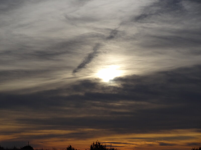 Sun Through Clouds — Gray