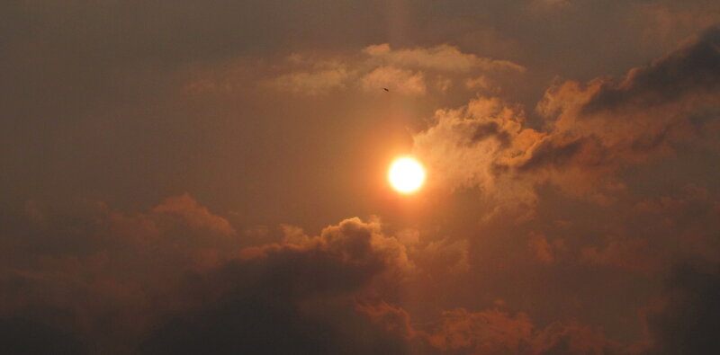 Sun Through Clouds — Orange, Dramatic, Sunset