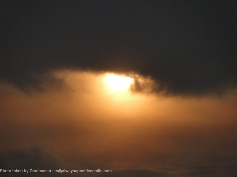 Sun Through Clouds — Orange, Dramatic