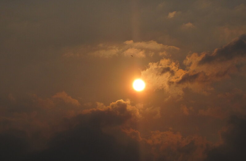 Sun Through Clouds — Orange