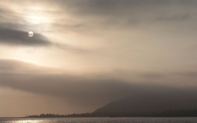 Sun Through Clouds over Water