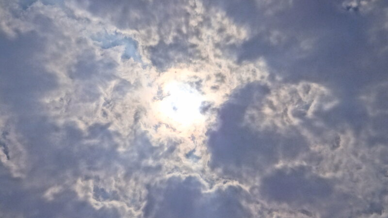 Sun Through Clouds — White, Dramatic