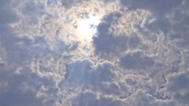 Sun Through Clouds — White, Serene