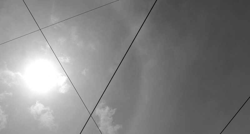 Sun Through Power Lines