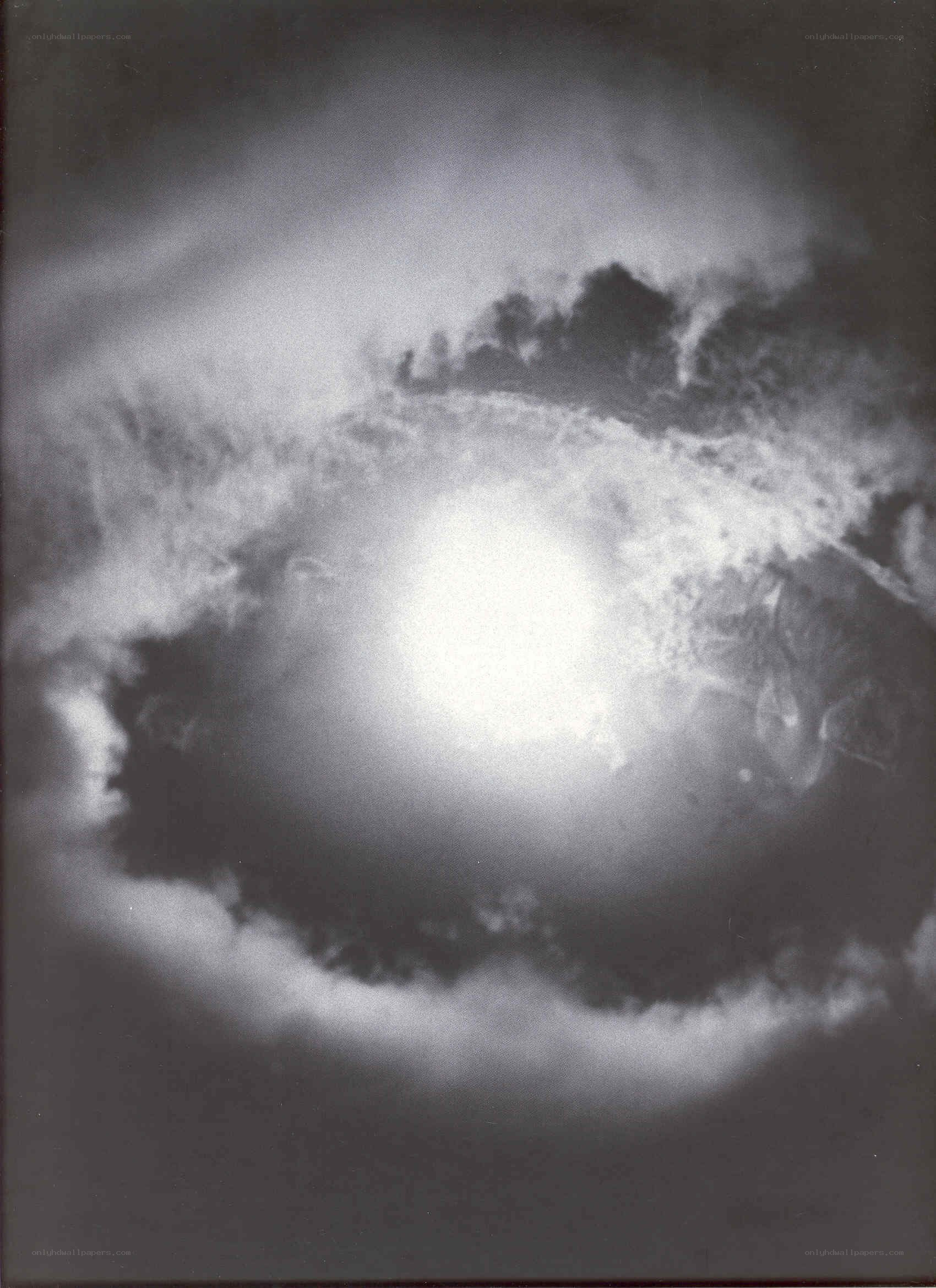 Sun through storm clouds
