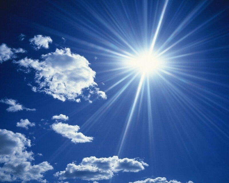 Sun with Rays in Sky