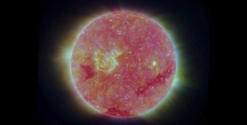 Sun with Solar Flare — Red