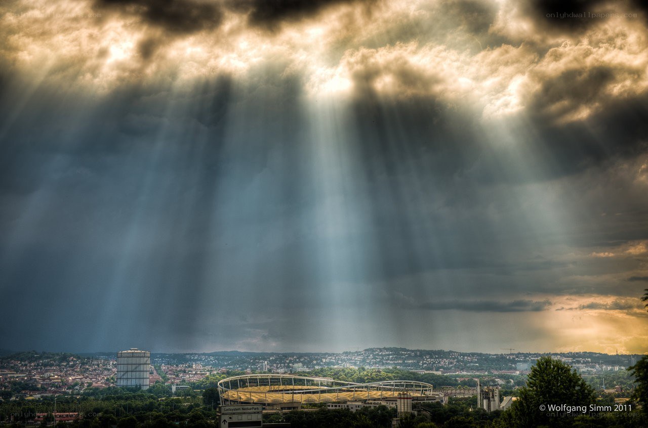 Sunbeams over a city