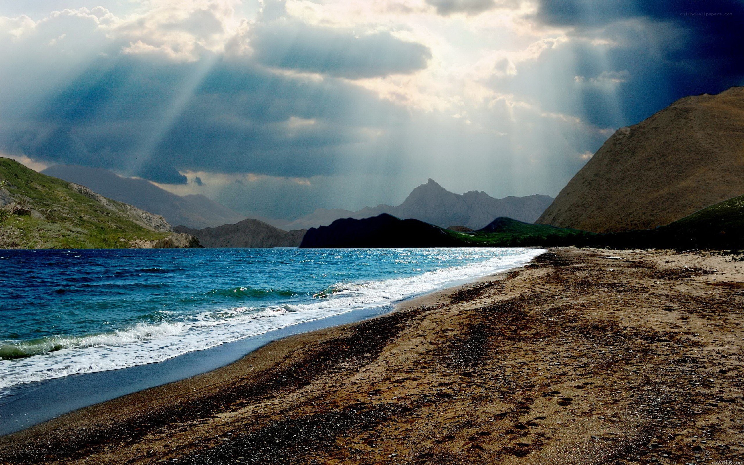 Sunbeams over a coastal bay