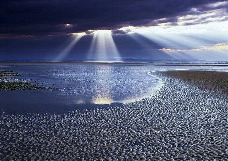 Sunbeams over the beach