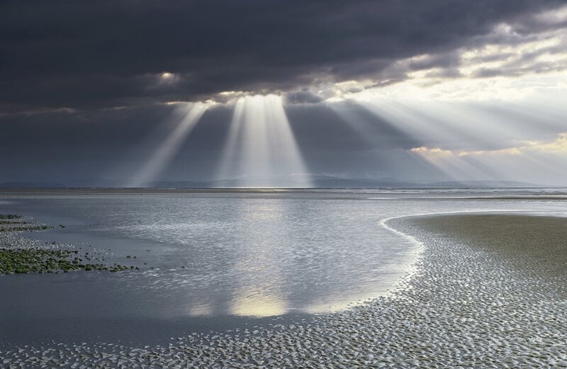 Sunbeams over Tidal Flats