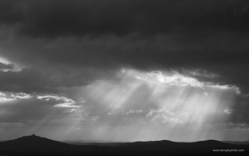 Sunbeams Through Clouds — Black