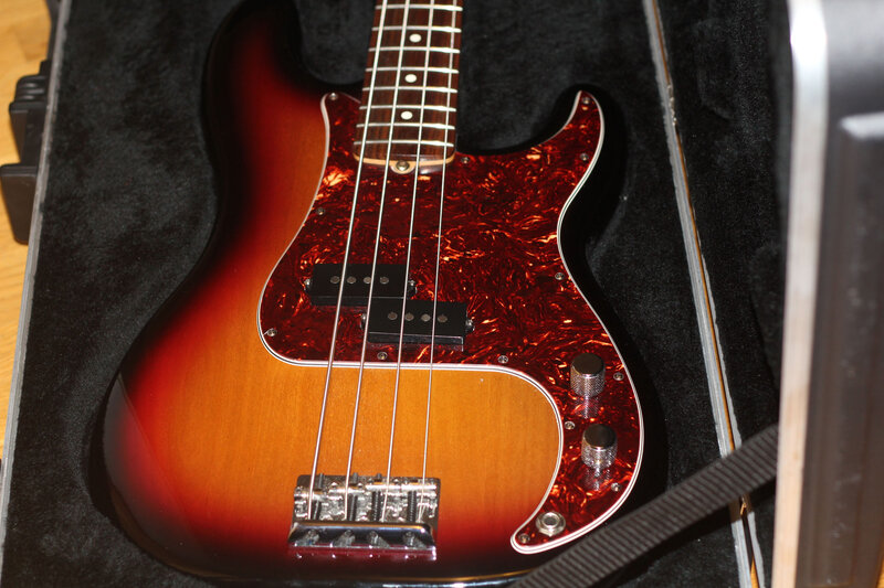 sunburst bass guitar in case