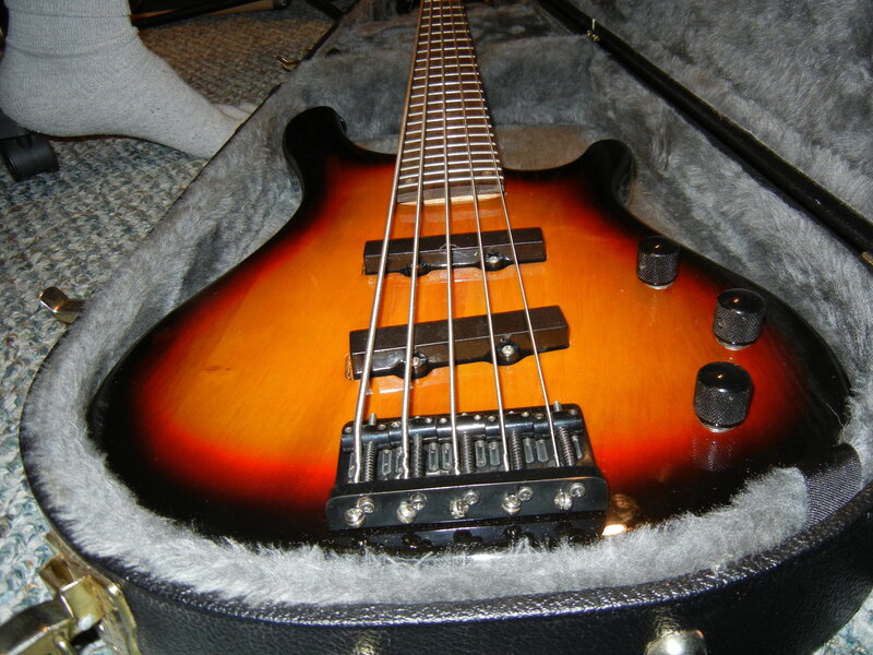 sunburst bass guitar in case