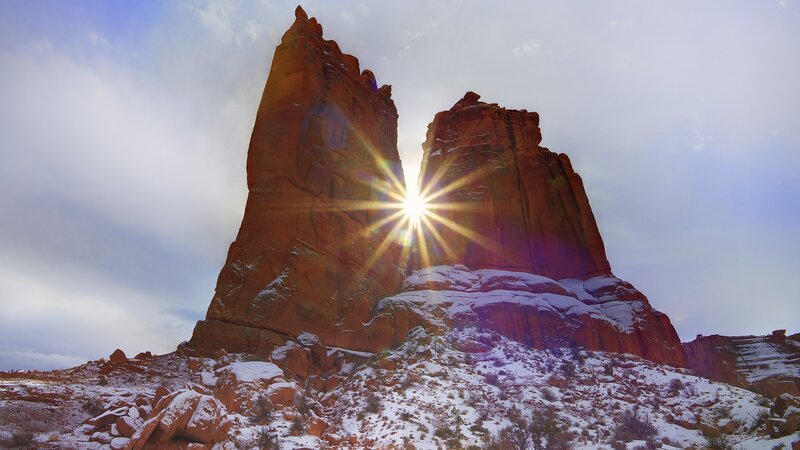 Sunburst between rock formations