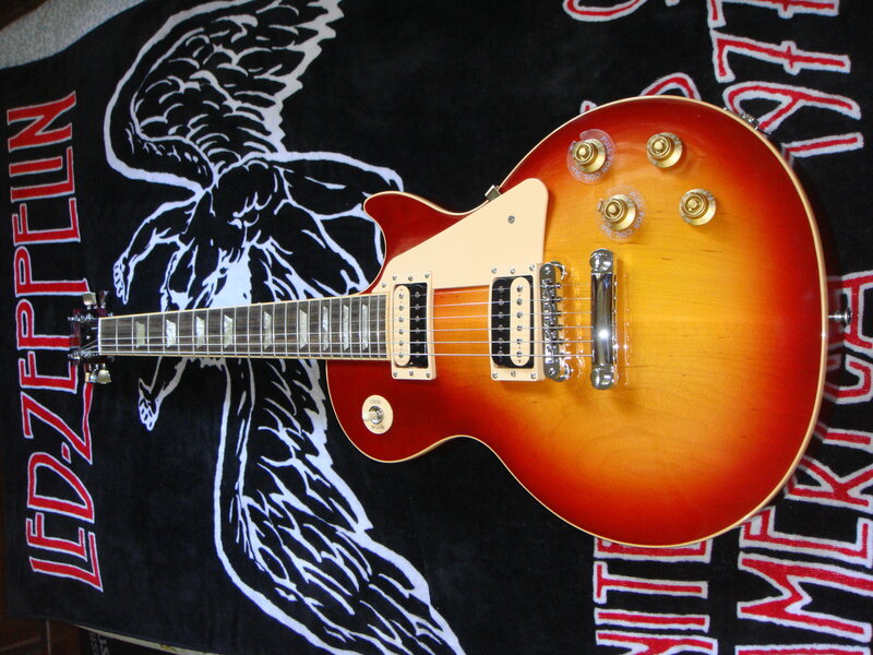 sunburst electric guitar on blanket