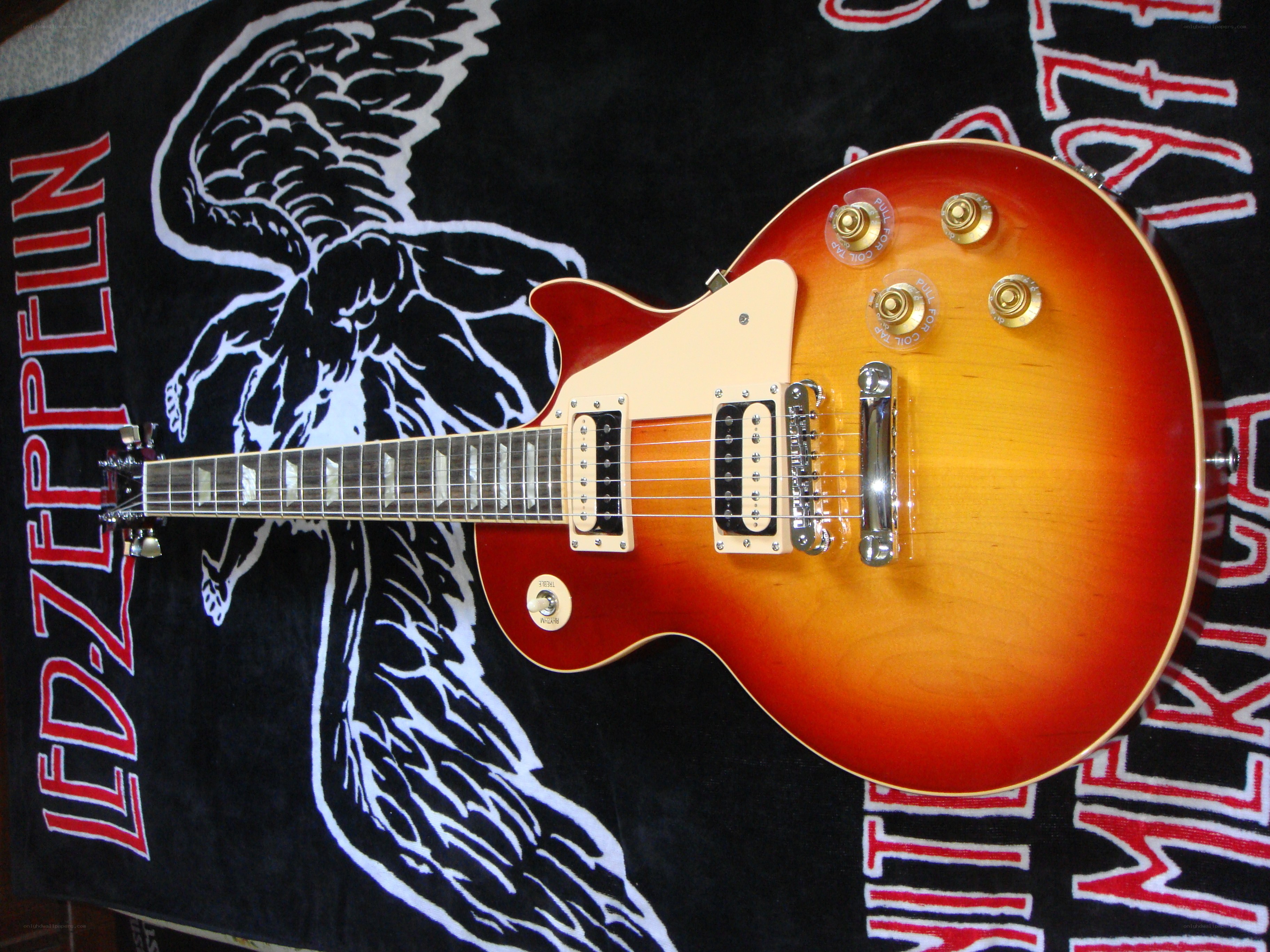 sunburst electric guitar on blanket