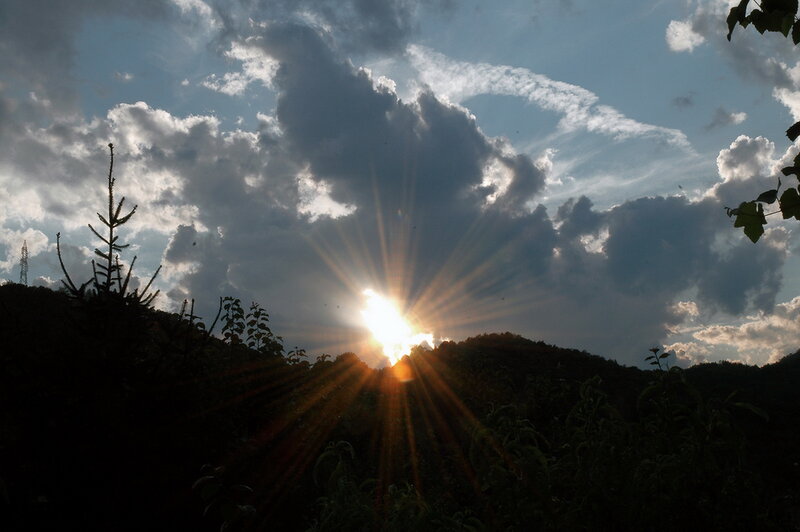 Sunburst over Hills