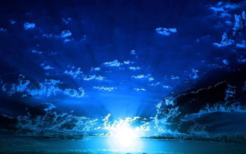Sunburst Through Clouds — Blue, Dramatic