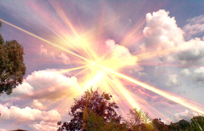 Sunburst Through Clouds — Yellow