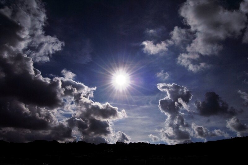 Sunburst through storm clouds
