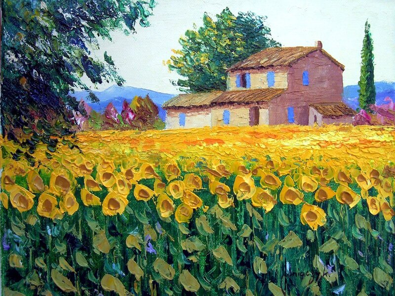 Sunflower field with farmhouse