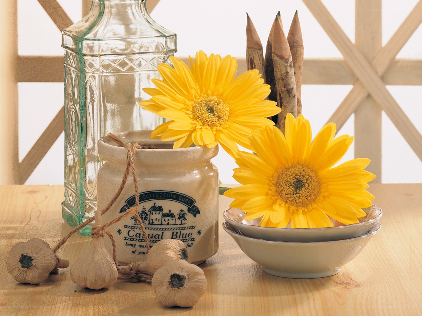Sunflowers and garlic on a table