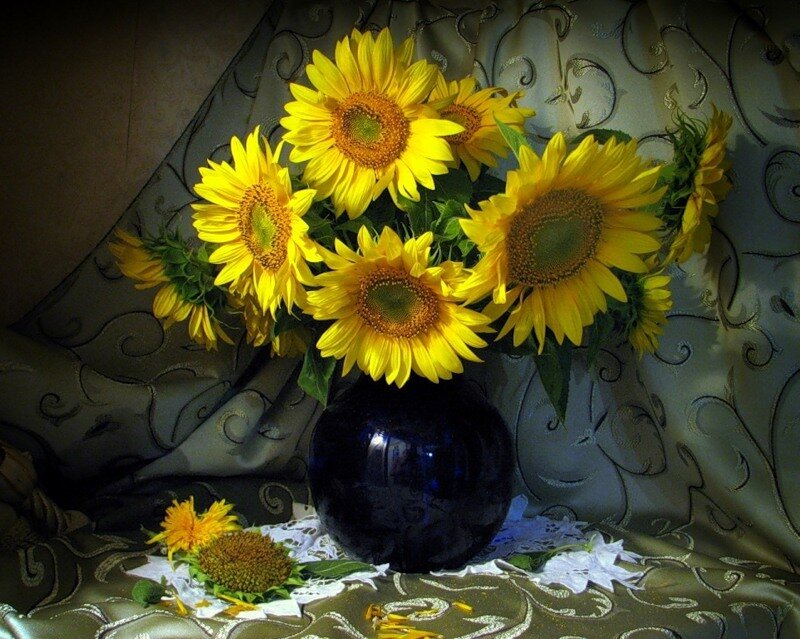 Sunflowers in a blue vase