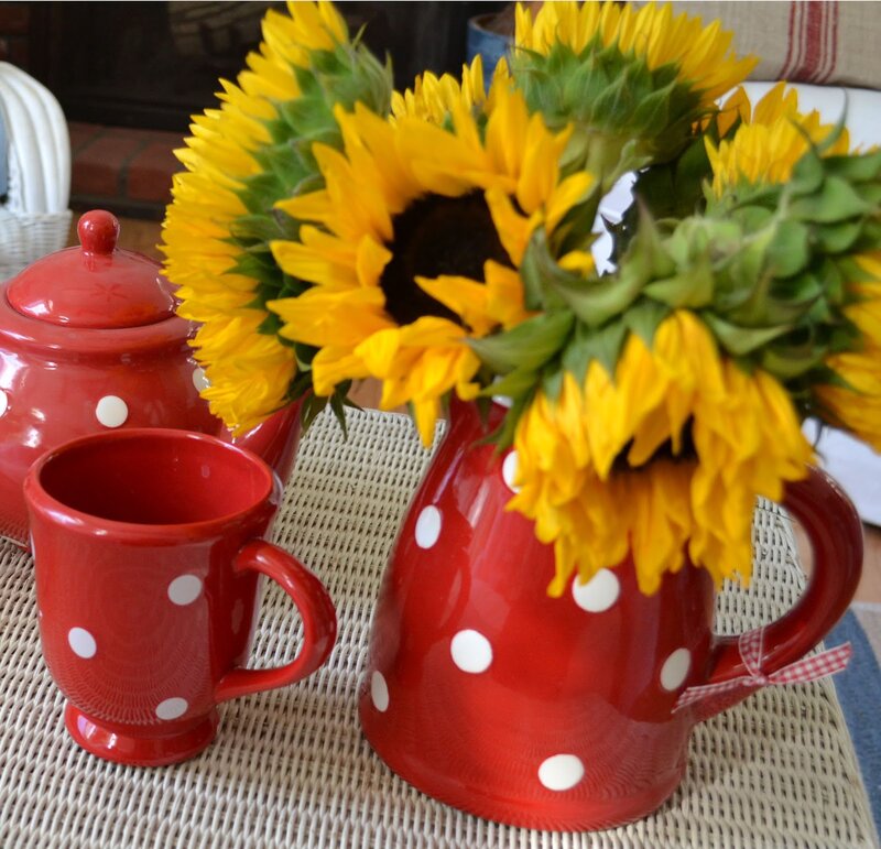 Sunflowers in Red Pitcher