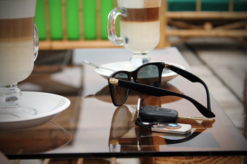 Sunglasses and Coffee Cups