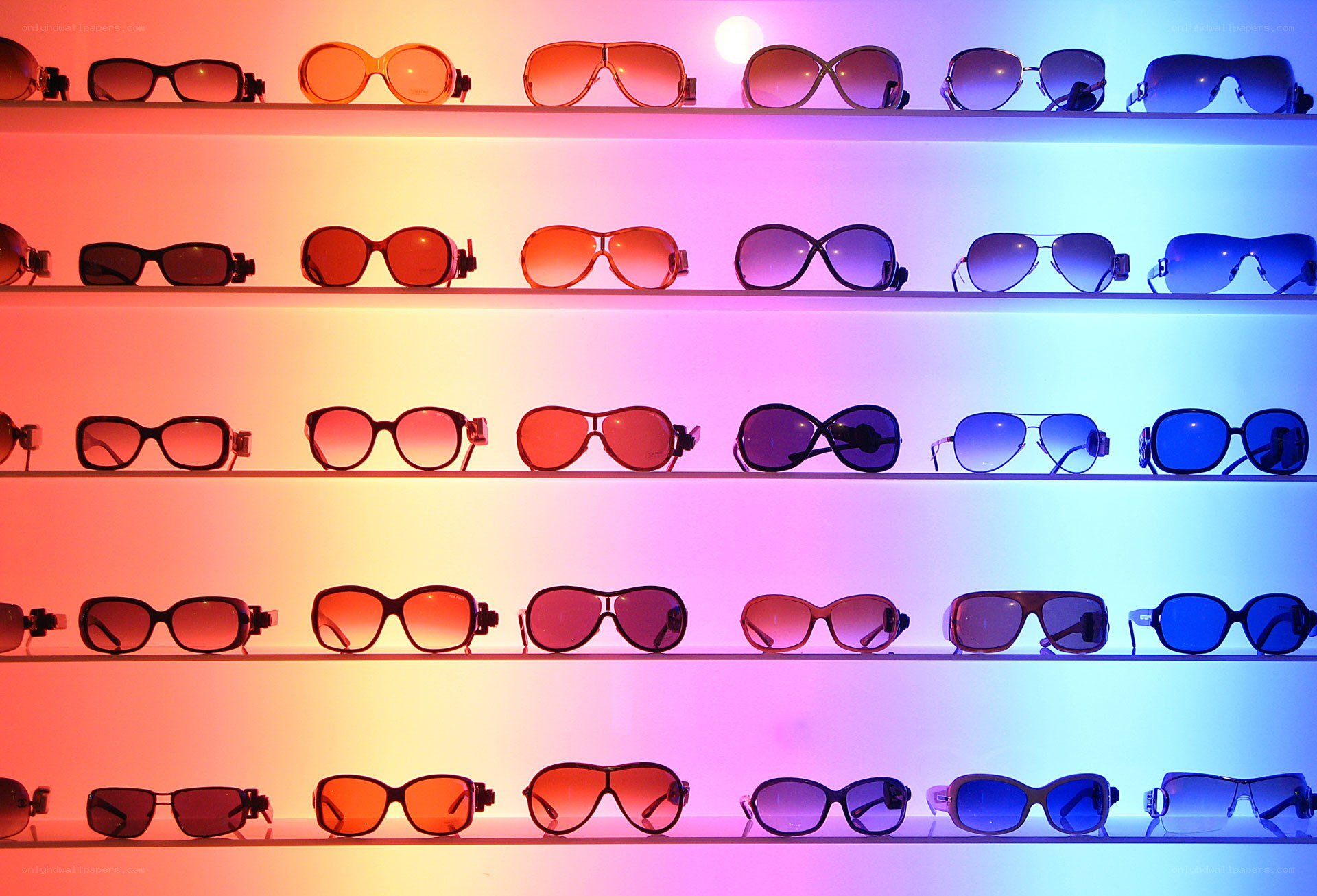 sunglasses display in colorful light