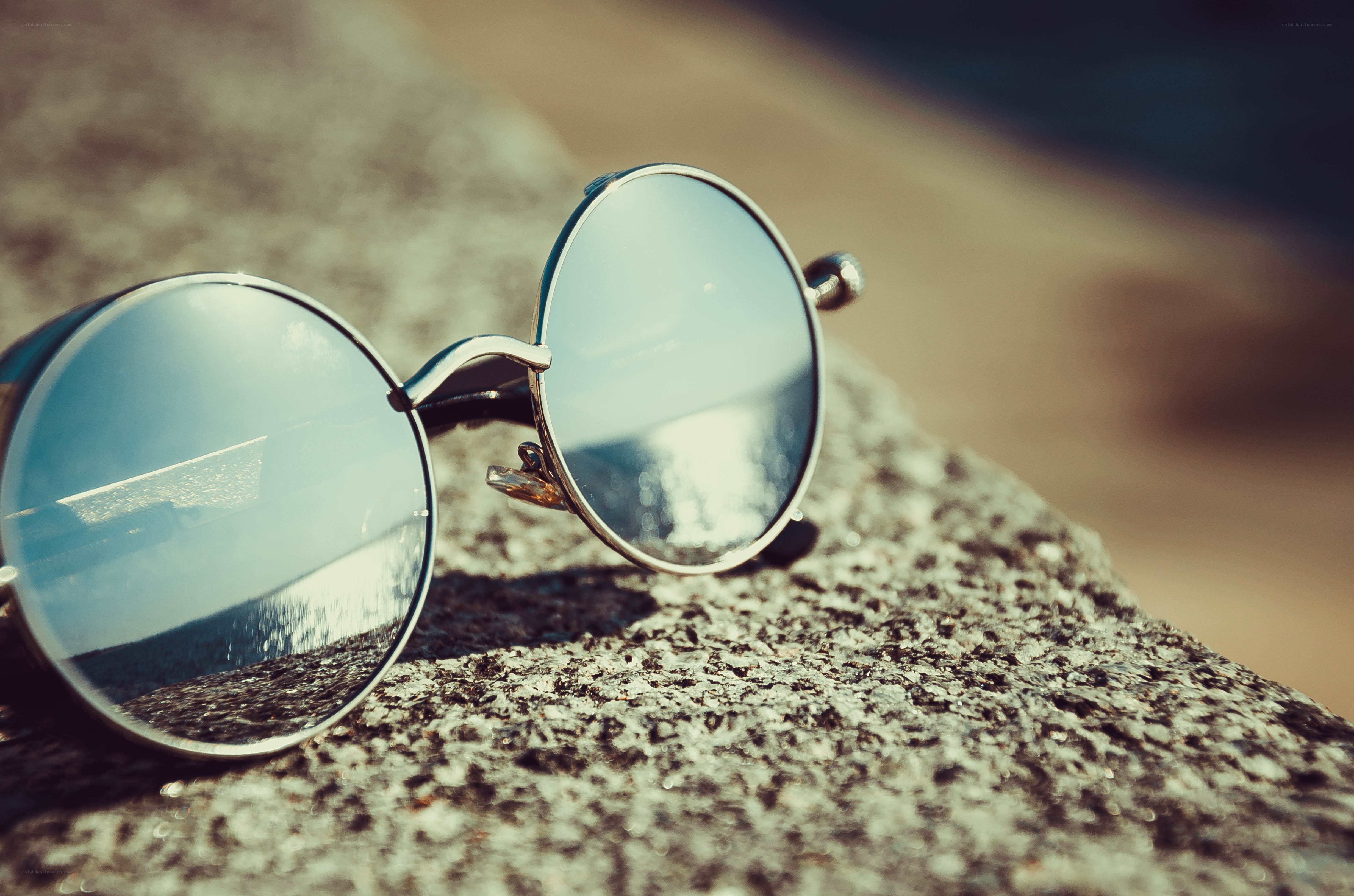 sunglasses on a rock