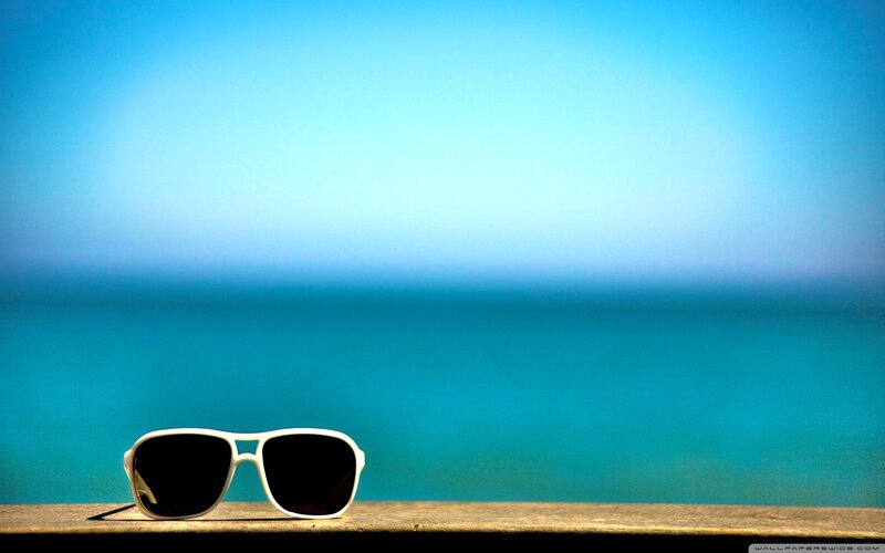 sunglasses on a wooden surface
