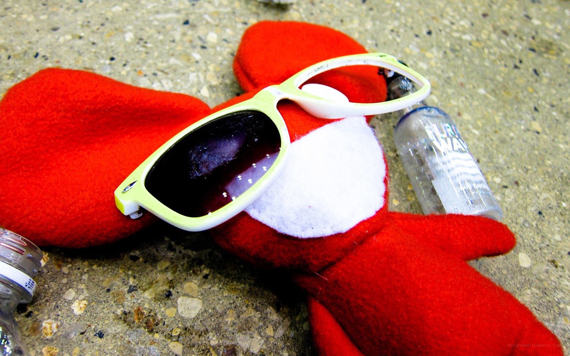 sunglasses on red toy
