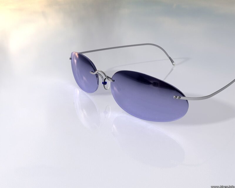 sunglasses on reflective surface