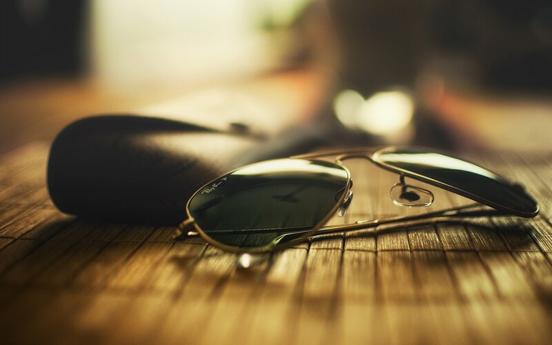 Sunglasses on Table — Brown