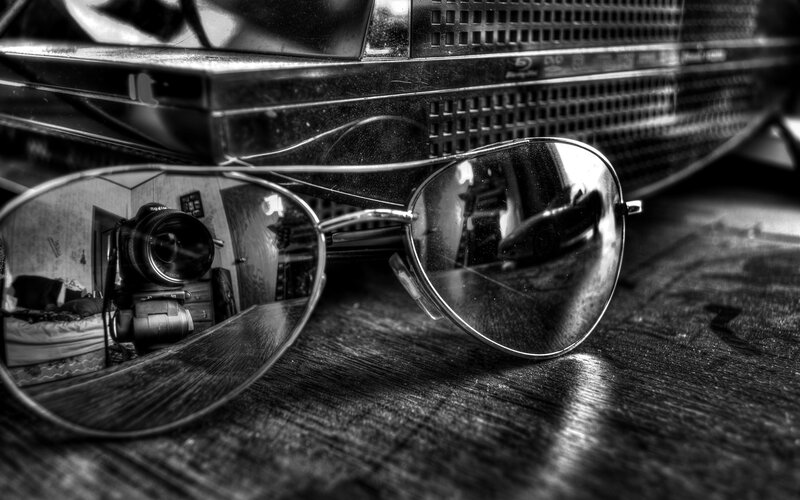Sunglasses on Wooden Surface — Black