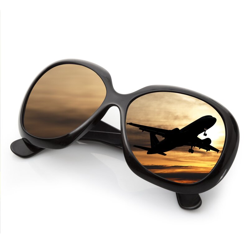 sunglasses with airplane reflection
