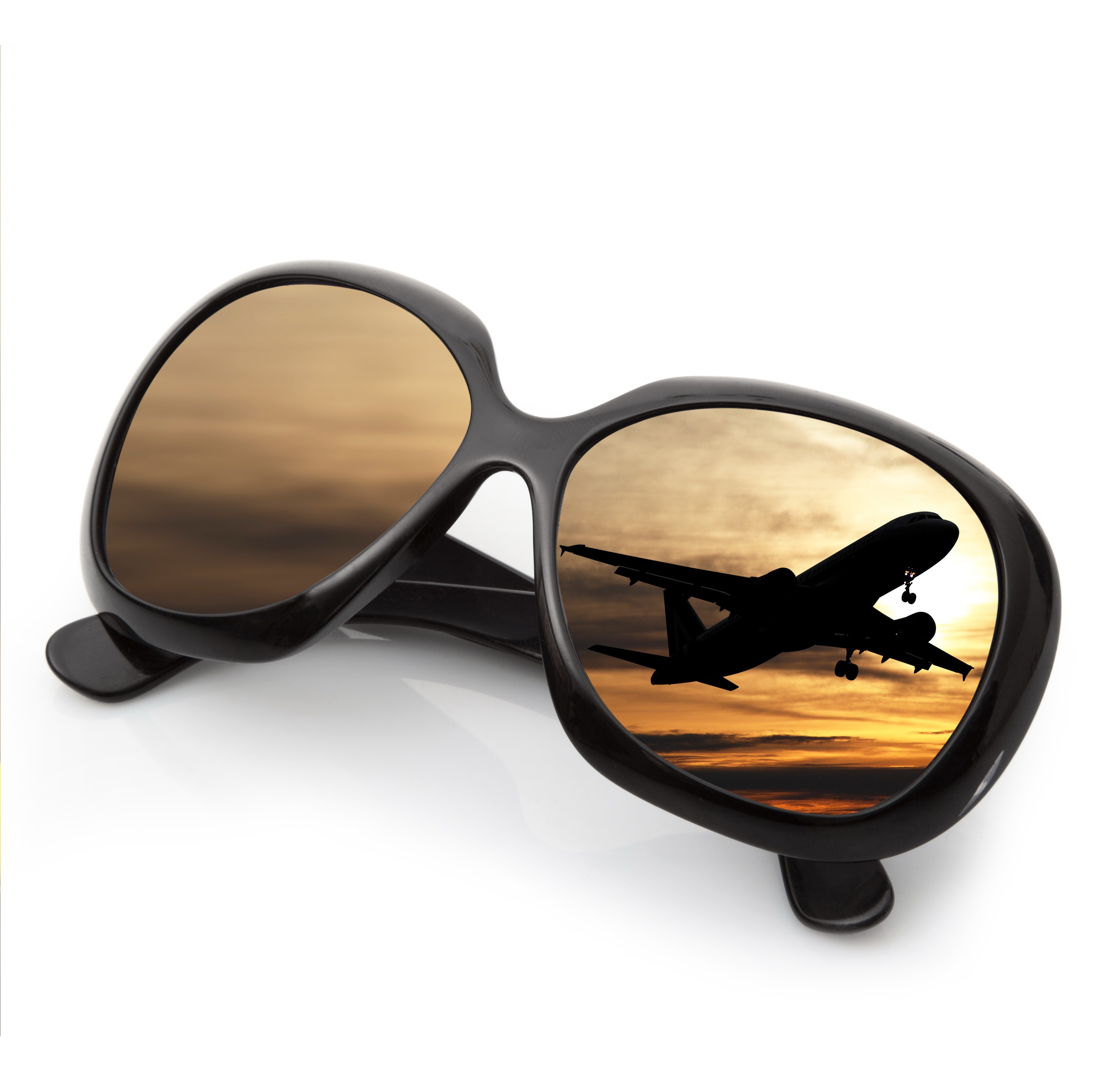 sunglasses with airplane reflection