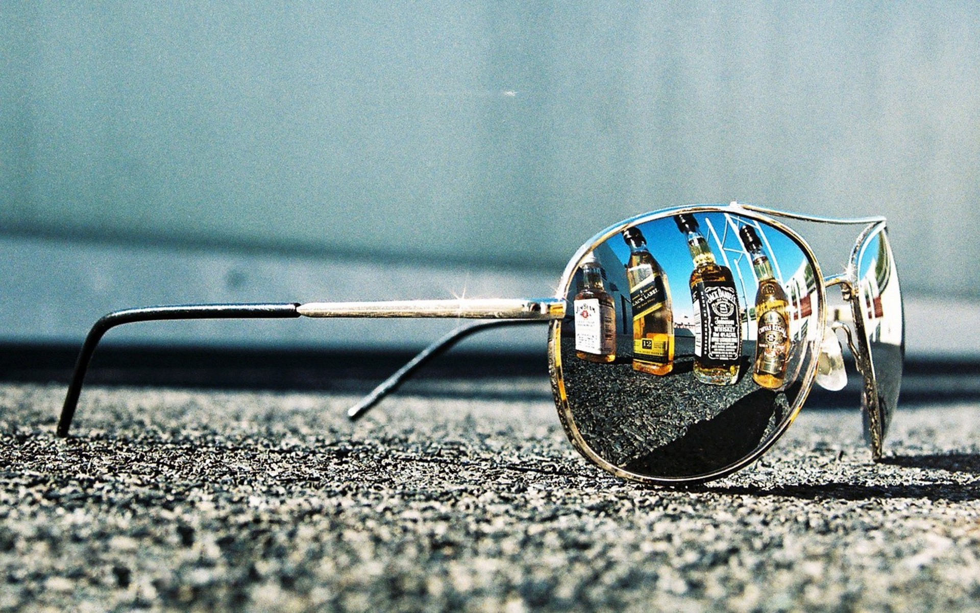 sunglasses with liquor reflections