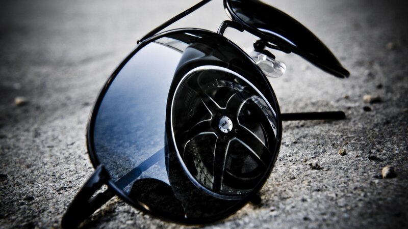 sunglasses with wheel reflection