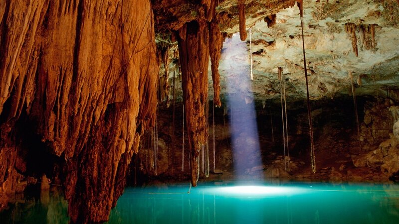 Sunlight beam in cave cenote