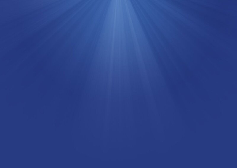 sunlight beams in blue water