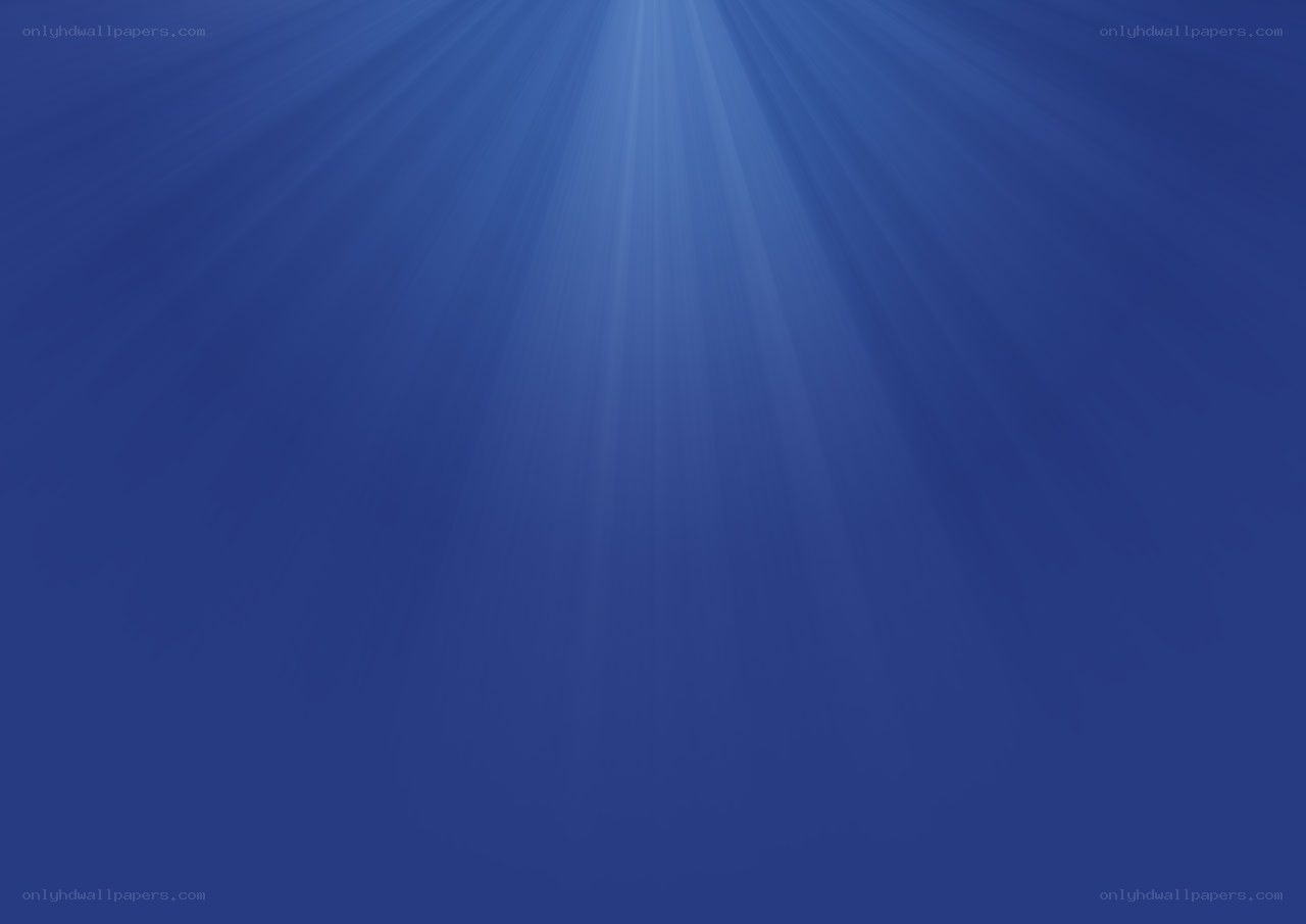 sunlight beams in blue water