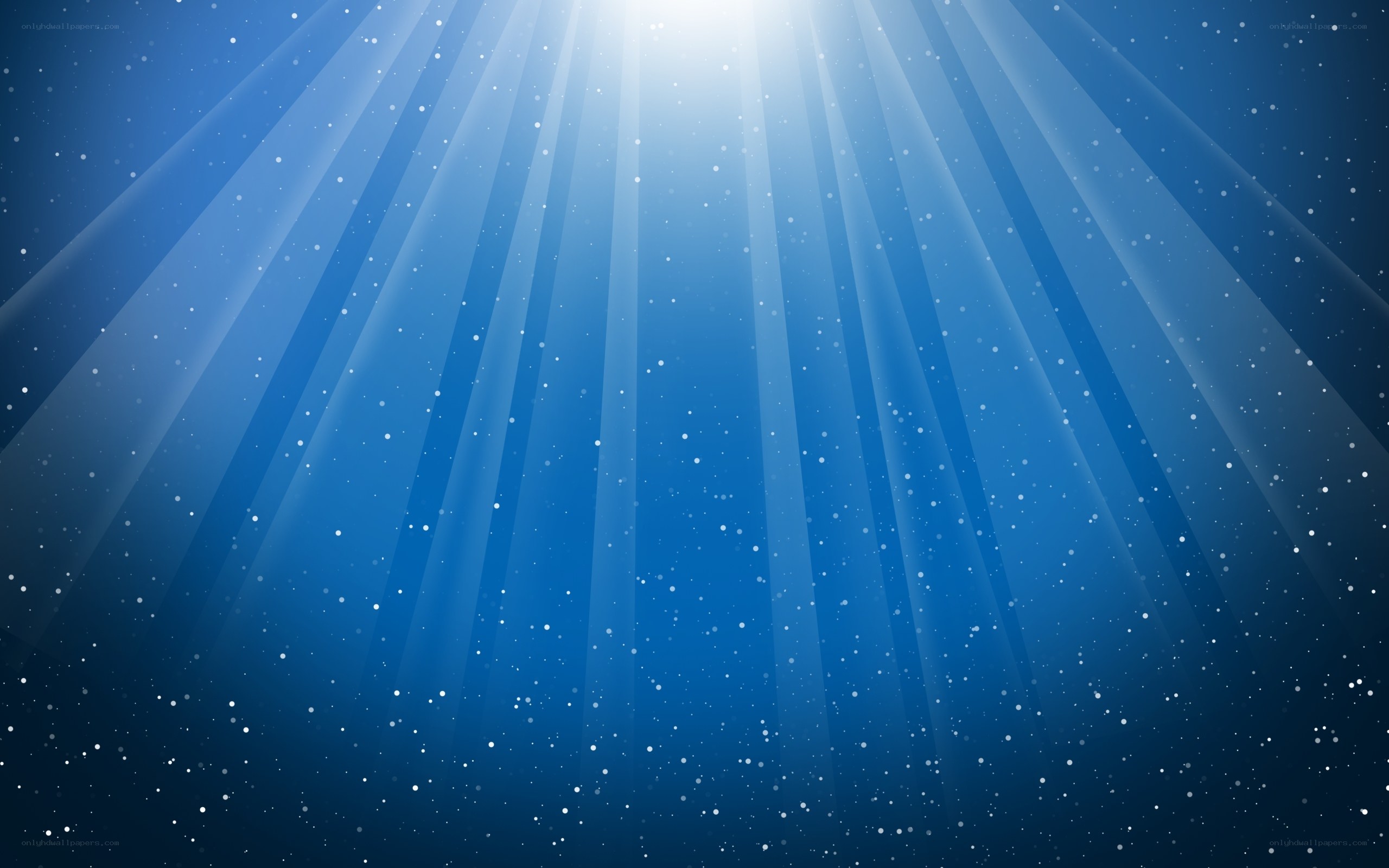sunlight beams in blue water