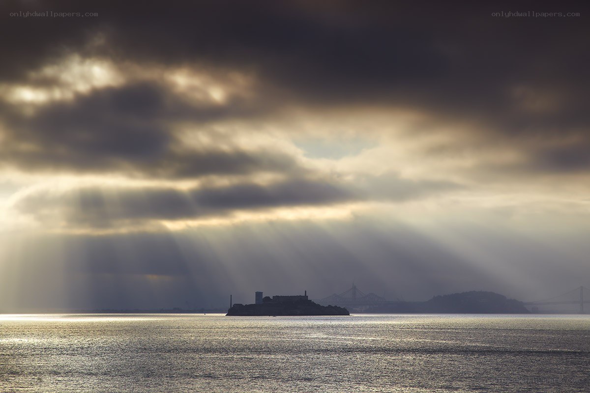 Sunlight beams over Alcatraz
