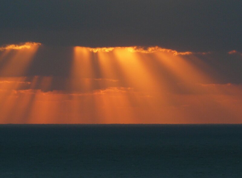 Sunlight Beams over Ocean — Orange, Dramatic